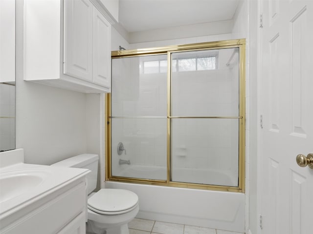 23334 Fairbranch Dr, Katy, TX 77494 - full bathroom with vanity, bath / shower combo with glass door, toilet, and tile patterned floors