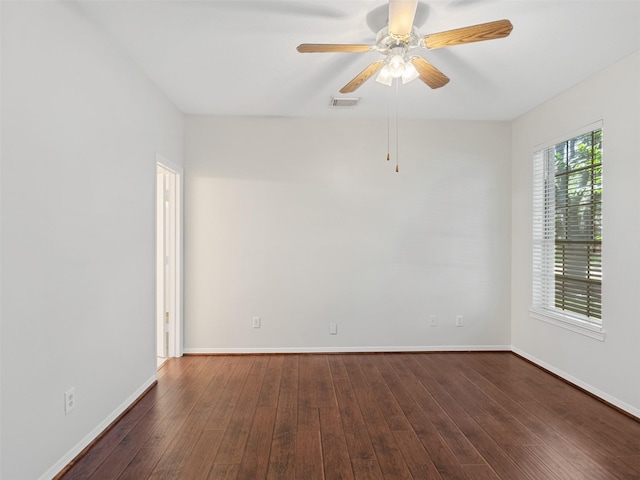 23334 Fairbranch Dr, Katy, TX 77494 - spare room with dark wood-style flooring, baseboards, and ceiling fan