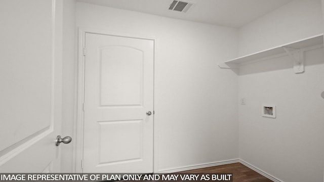 1346 Heather Rosewood Ln, Conroe, TX 77301 - washroom with washer hookup, dark wood-type flooring, and baseboards
