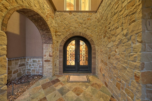 view of exterior entry with french doors