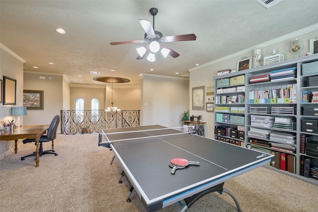 recreation room with carpet floors, crown molding, a textured ceiling, recessed lighting, and a ceiling fan