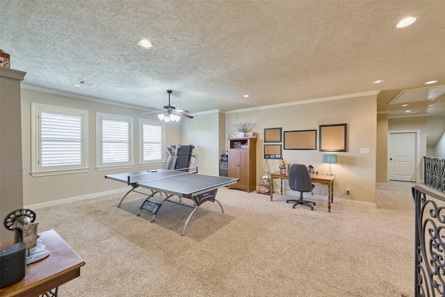 game room featuring carpet, crown molding, baseboards, a desk, and recessed lighting