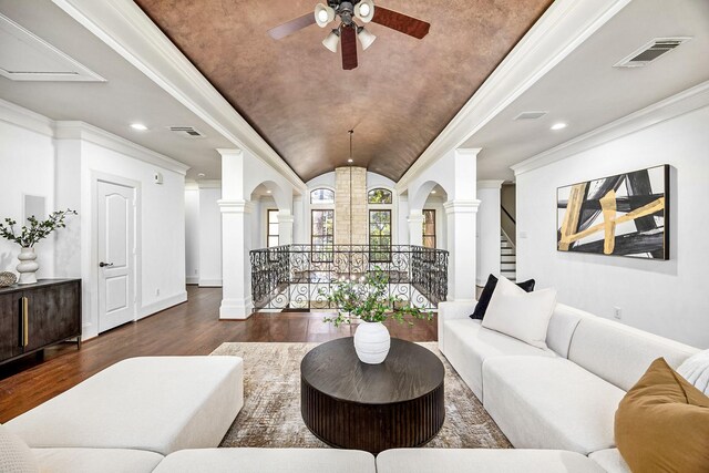 5105 Pocahontas St, Bellaire, TX 77401 - living area featuring wood finished floors, decorative columns, lofted ceiling, a ceiling fan, and baseboards