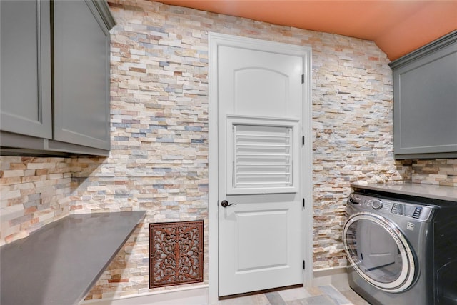 13315 Timberwild Ct, Tomball, TX 77375 - clothes washing area with washer / clothes dryer and cabinet space