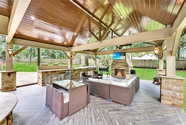 13315 Timberwild Ct, Tomball, TX 77375 - view of patio featuring a gazebo, an outdoor living space with a fireplace, a deck, and area for grilling