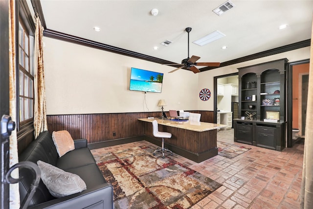 13315 Timberwild Ct, Tomball, TX 77375 - office featuring ornamental molding, a wainscoted wall, brick flooring, ceiling fan, and wood walls
