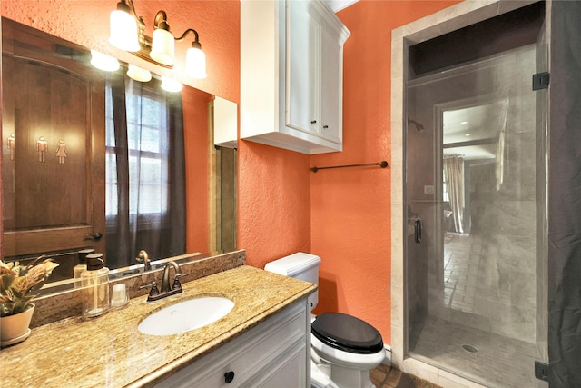 13315 Timberwild Ct, Tomball, TX 77375 - full bathroom with a textured wall, a stall shower, toilet, and vanity