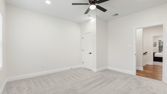 10002 Wilma Ln, Beach City, TX 77523 - carpeted empty room featuring a ceiling fan, baseboards, and recessed lighting