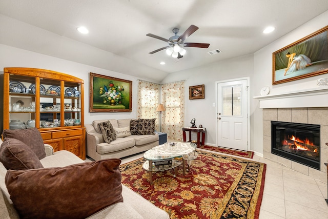 living area featuring a fireplace, a ceiling fan, recessed lighting, vaulted ceiling, and baseboards