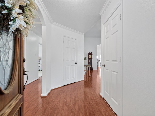 20118 Lakespire Dr, Katy, TX 77449 - corridor with ornamental molding, wood finished floors, and baseboards