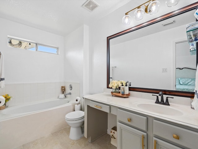 20118 Lakespire Dr, Katy, TX 77449 - ensuite bathroom featuring a garden tub, vanity, and toilet