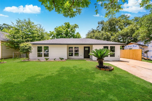 view of front of property featuring roof with shingles