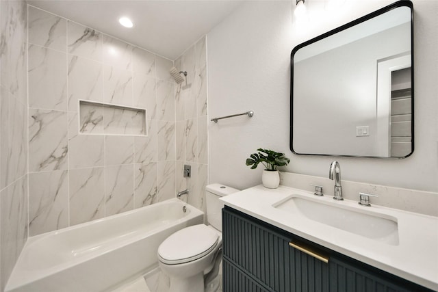 bathroom featuring toilet, bathtub / shower combination, and vanity