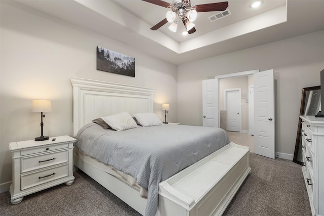 2510 Ocean Key Dr, Texas City, TX 77568 - bedroom featuring dark carpet, baseboards, a raised ceiling, recessed lighting, and ceiling fan