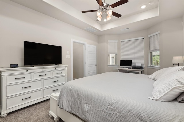 2510 Ocean Key Dr, Texas City, TX 77568 - bedroom featuring carpet floors, a tray ceiling, recessed lighting, and a ceiling fan