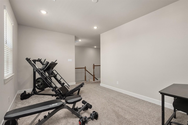 2510 Ocean Key Dr, Texas City, TX 77568 - workout room featuring baseboards, recessed lighting, healthy amount of natural light, and light colored carpet