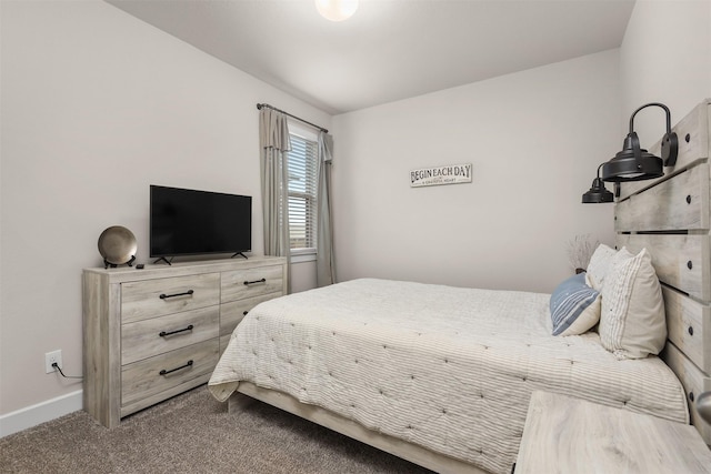 2510 Ocean Key Dr, Texas City, TX 77568 - bedroom with dark carpet and baseboards