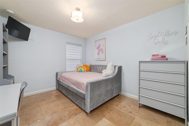 bedroom with baseboards