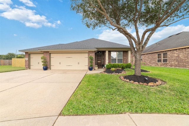 view of front of property with brick siding, a garage, driveway, and roof with shingles