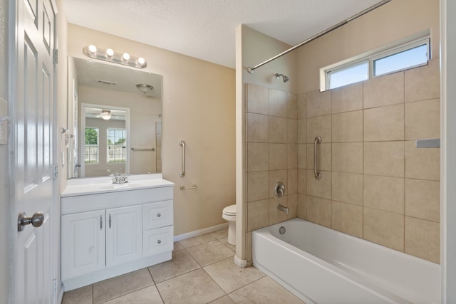 full bathroom with toilet, tile patterned floors, vanity, shower / tub combination, and baseboards