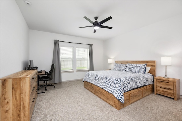 502 Rain Cloud Dr, Baytown, TX 77523 - carpeted bedroom featuring a desk, a ceiling fan, and baseboards