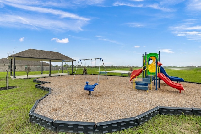 502 Rain Cloud Dr, Baytown, TX 77523 - communal playground featuring a yard