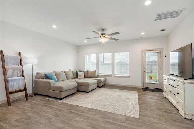 502 Rain Cloud Dr, Baytown, TX 77523 - living room with recessed lighting, light wood-style flooring, a ceiling fan, and baseboards