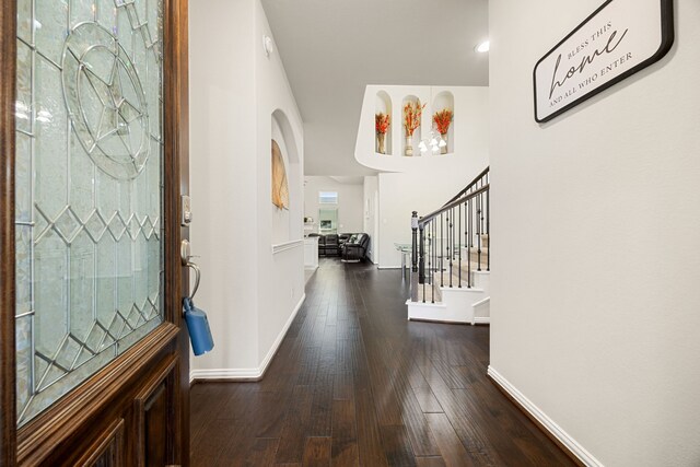 11707 Finnick Bend Dr, Tomball, TX 77377 - entryway featuring stairway, baseboards, and wood-type flooring