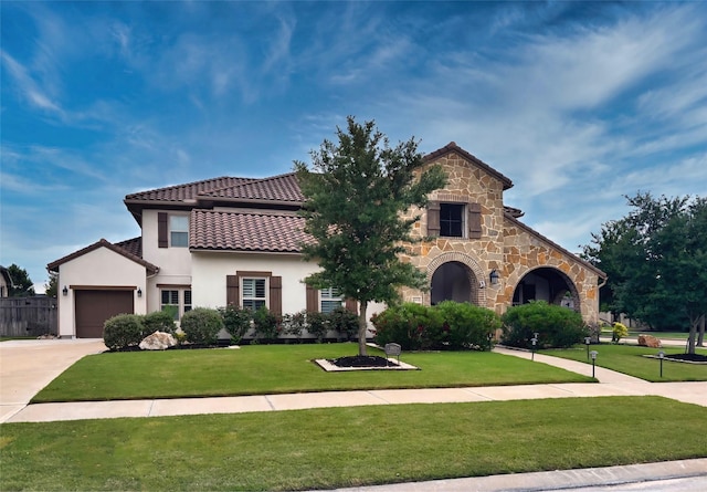 5502 Charlton Ridge Ln, Fulshear, TX 77441 - view of front of property with a tile roof, concrete driveway, a front lawn, an attached garage, and stucco siding