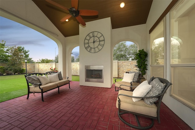 5502 Charlton Ridge Ln, Fulshear, TX 77441 - view of patio with an outdoor living space with a fireplace and a ceiling fan