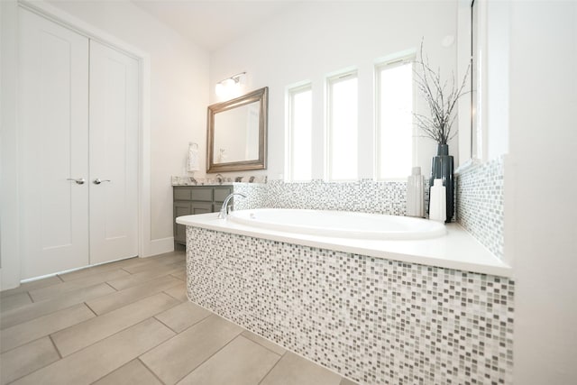 5502 Charlton Ridge Ln, Fulshear, TX 77441 - bathroom with a garden tub and vanity