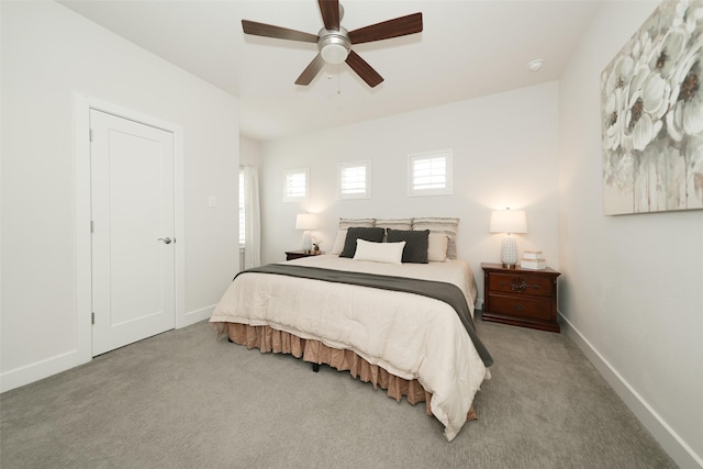 5502 Charlton Ridge Ln, Fulshear, TX 77441 - bedroom with carpet flooring, baseboards, and ceiling fan