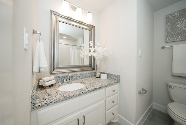 5502 Charlton Ridge Ln, Fulshear, TX 77441 - full bathroom featuring toilet, baseboards, and vanity