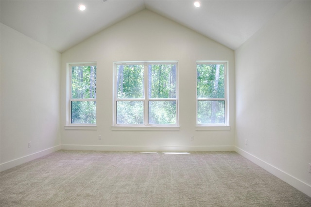 1973 Greentree Dr, Huntsville, TX 77340 - carpeted spare room with vaulted ceiling and recessed lighting