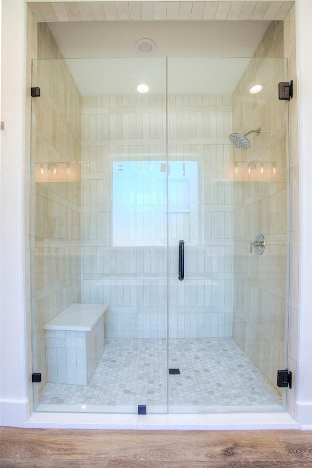 1973 Greentree Dr, Huntsville, TX 77340 - bathroom with a shower stall and wood finished floors
