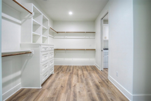 1973 Greentree Dr, Huntsville, TX 77340 - spacious closet featuring light wood-style floors