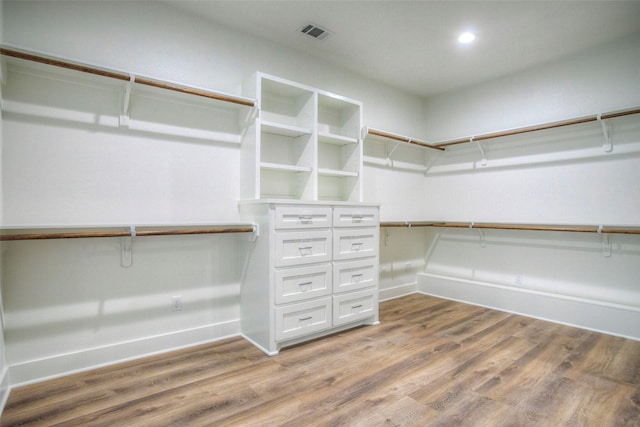 1973 Greentree Dr, Huntsville, TX 77340 - walk in closet with light wood-style floors