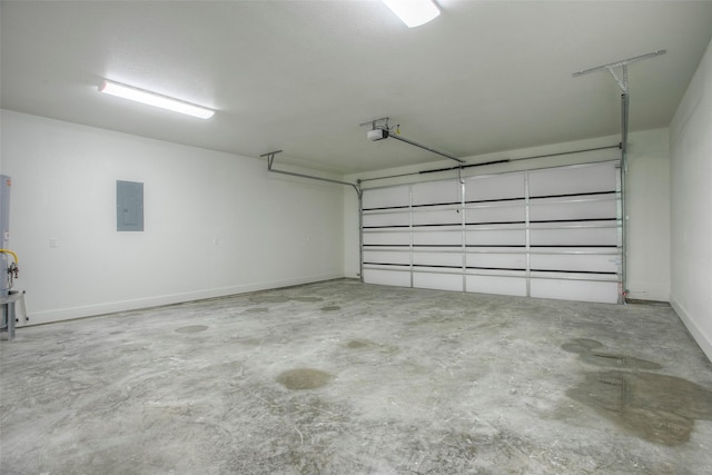 1973 Greentree Dr, Huntsville, TX 77340 - garage with electric panel and a garage door opener