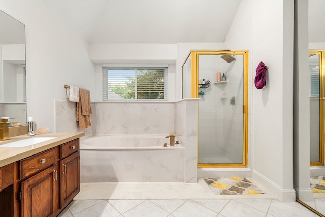 12114 Paddock Way, Houston, TX 77065 - full bathroom featuring a stall shower, a bath, vanity, tile patterned floors, and vaulted ceiling