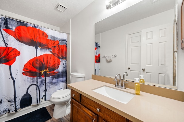 12114 Paddock Way, Houston, TX 77065 - bathroom with toilet, wood finished floors, vanity, and curtained shower
