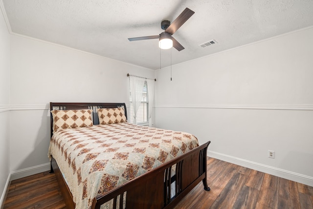 12114 Paddock Way, Houston, TX 77065 - bedroom with wood finished floors, a textured ceiling, baseboards, and ceiling fan