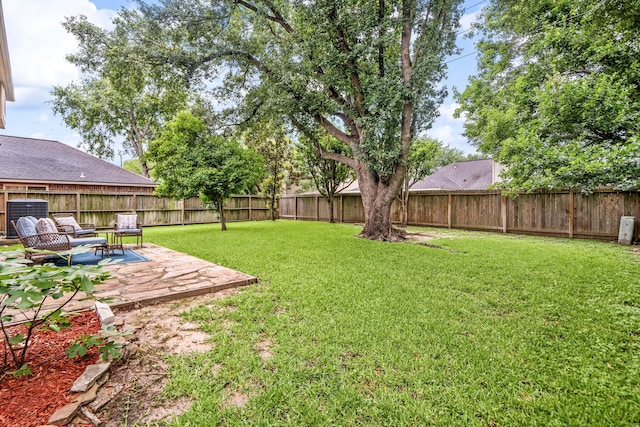 12114 Paddock Way, Houston, TX 77065 - view of yard featuring central air condition unit and a patio area