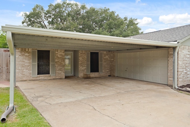 1926 Klauke Ct, Rosenberg, TX 77471 - view of patio / terrace with a garage and concrete driveway