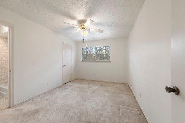6131 Knollview Dr, Spring, TX 77389 - carpeted empty room featuring a textured ceiling, a ceiling fan, and baseboards