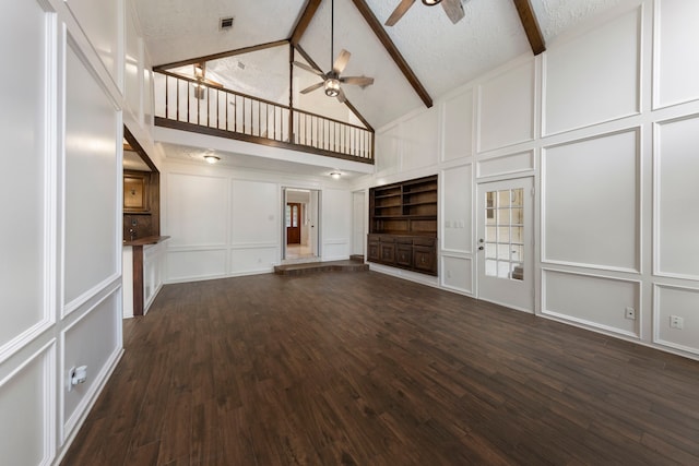 6131 Knollview Dr, Spring, TX 77389 - unfurnished living room with a decorative wall, ceiling fan, high vaulted ceiling, beamed ceiling, and dark wood-style floors