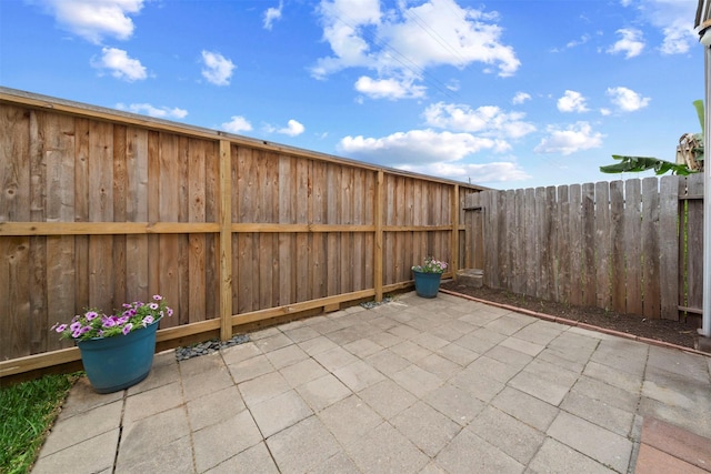 view of patio with a fenced backyard