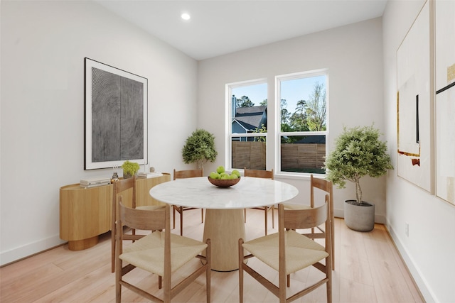 1420 Flamingo St, Conroe, TX 77385 - dining room with light wood finished floors, recessed lighting, and baseboards
