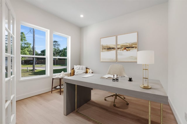 1420 Flamingo St, Conroe, TX 77385 - home office featuring plenty of natural light, baseboards, recessed lighting, and light wood-type flooring