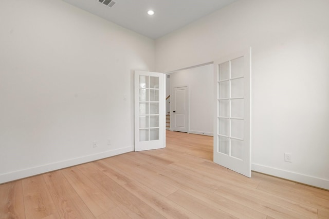 1420 Flamingo St, Conroe, TX 77385 - empty room with baseboards, light wood-style flooring, and recessed lighting