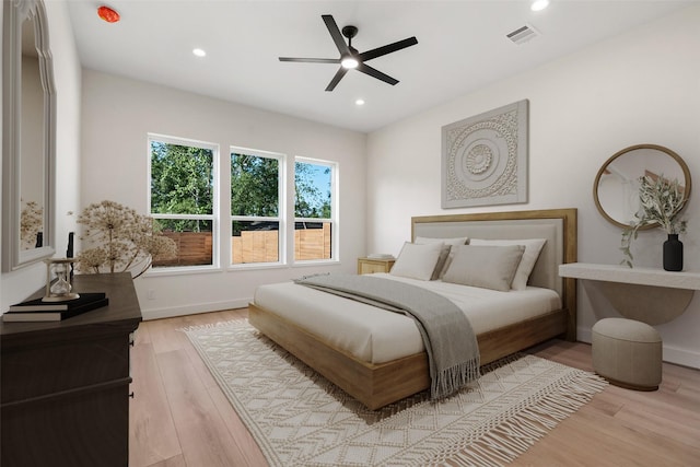 1420 Flamingo St, Conroe, TX 77385 - bedroom with wood finished floors, recessed lighting, and ceiling fan